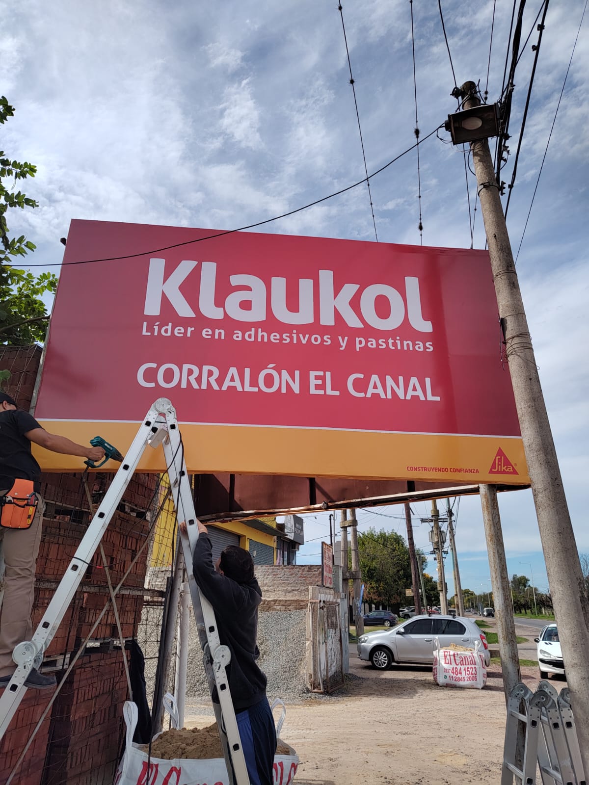 Cartel saliente de Klaukol