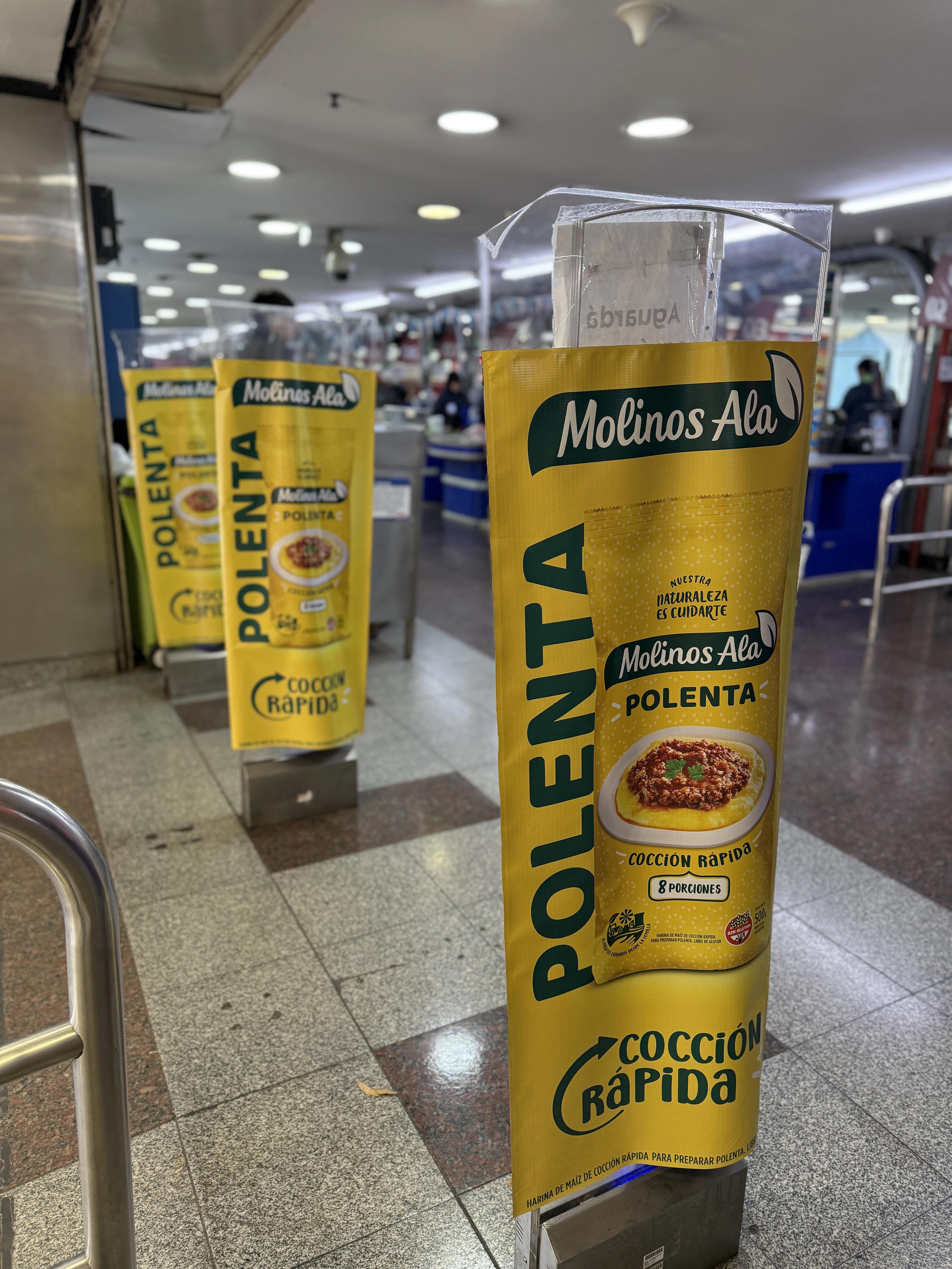 Cubre alarmas publicitario para Molinos en supermercado